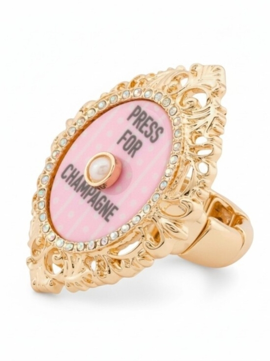 Betsey Johnson Jewelry - 👉✨️ Betsey Johnson Gold and Pink 'Press for Champagne' Statement Stretch Ring